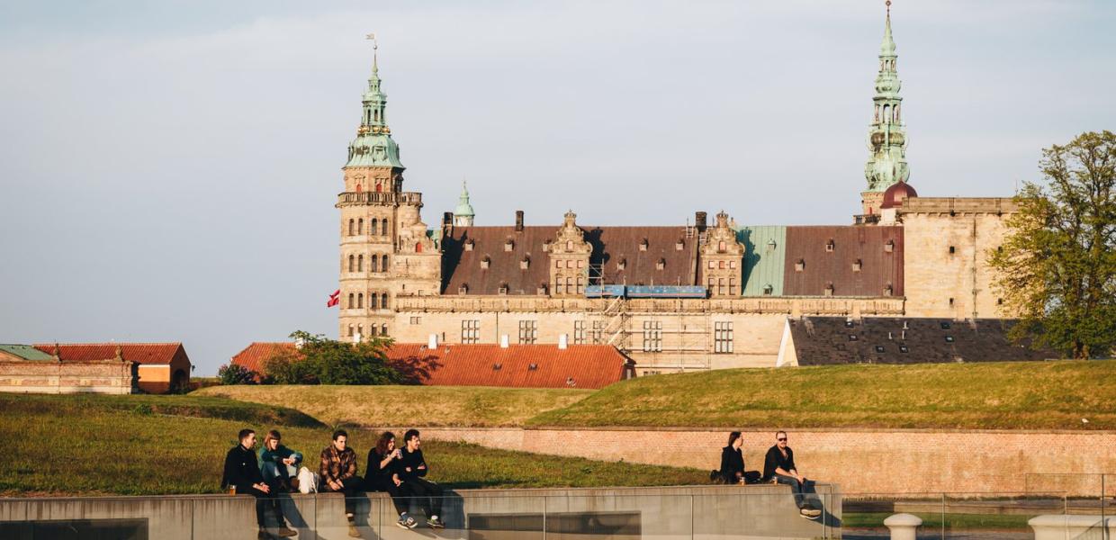 People hanging out in front of Kronborg Castle in Helsingør