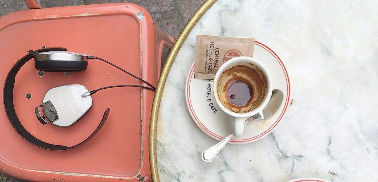 Headphones and coffee on a cafe in Copenhagen