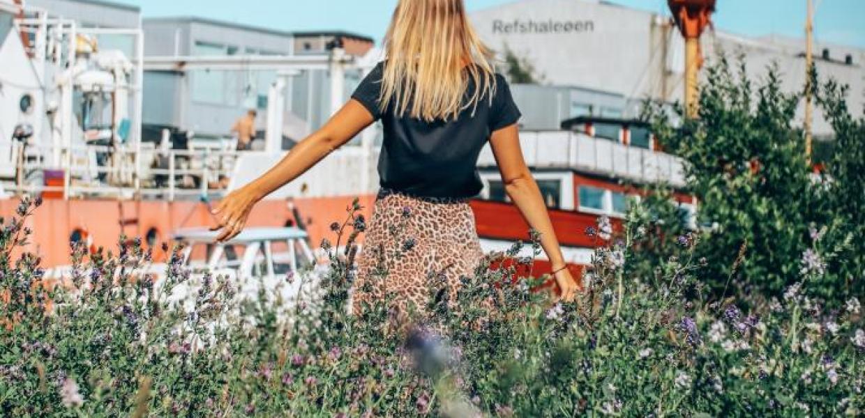 Woman wandering at Reffen street food market in Copenhagen