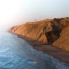 Rubjerg Knude Lighthouse view with cliffs and sea, North Jutland