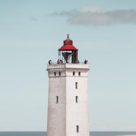 Rubjerg Knude Lighthouse in front of blue sky, North Jutland in Denmark