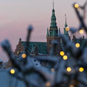 Frederiksborg castle surrounded by snow