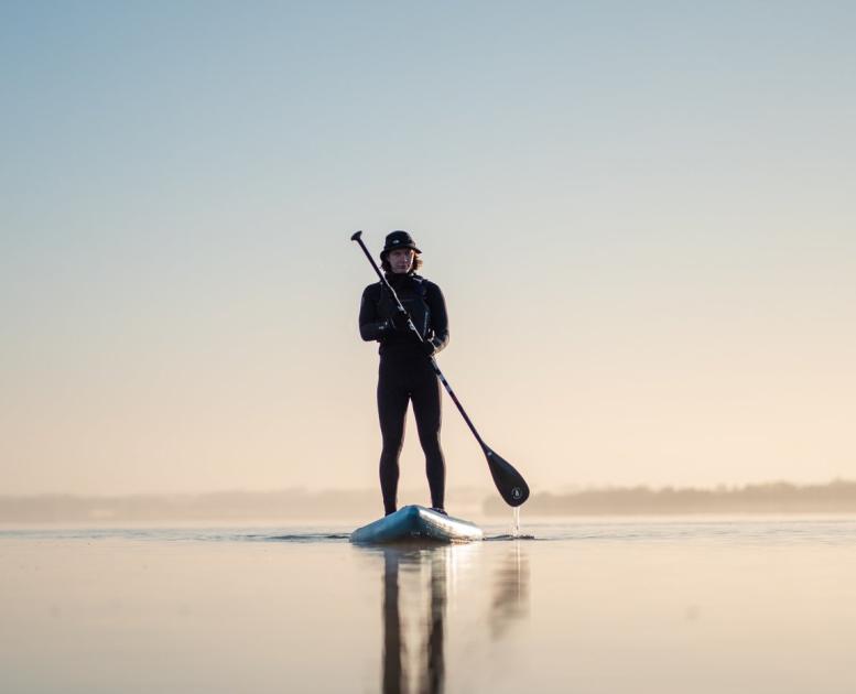 Man stand up paddling at Lynæs in North Zealand